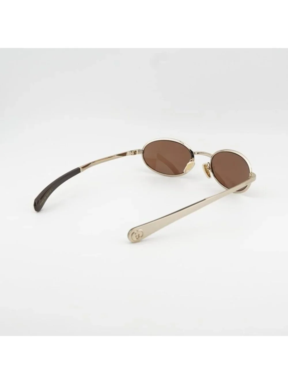 Gucci GG1942S 003 Women Sunglasses Gold Oval Frame, Brown Lenses